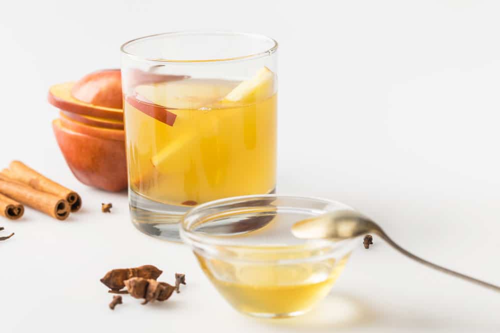 Apple cider vinegar, olive oil, honey, and essential oils hair mask